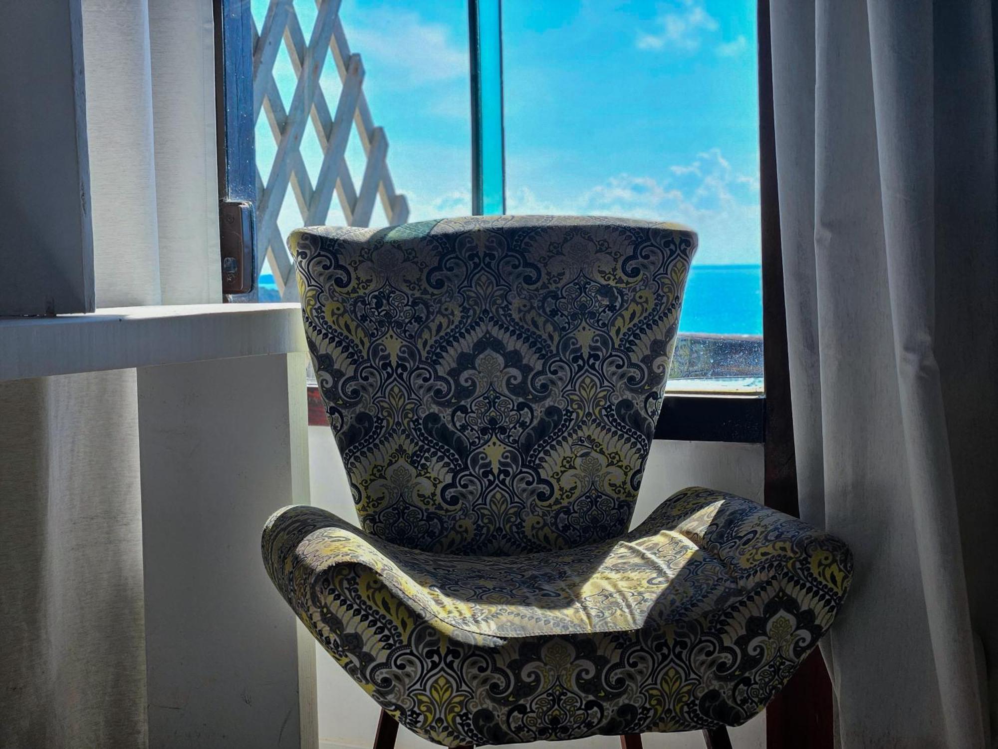 Bella Vista Ocean View Hotell Búzios Eksteriør bilde A chair in a hotel room